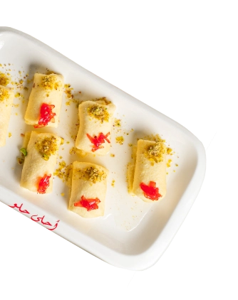 A plate of delicate cream-filled Lebanese sweets